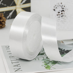 Premium Satin Ribbon – Versatile & Elegant in white, ideal for gift wrapping and craft projects.
