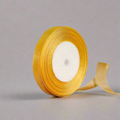 🎀 Sheer Organza Ribbon – Elegant & Versatile Finish in vibrant yellow color, perfect for gift wrapping and crafts.