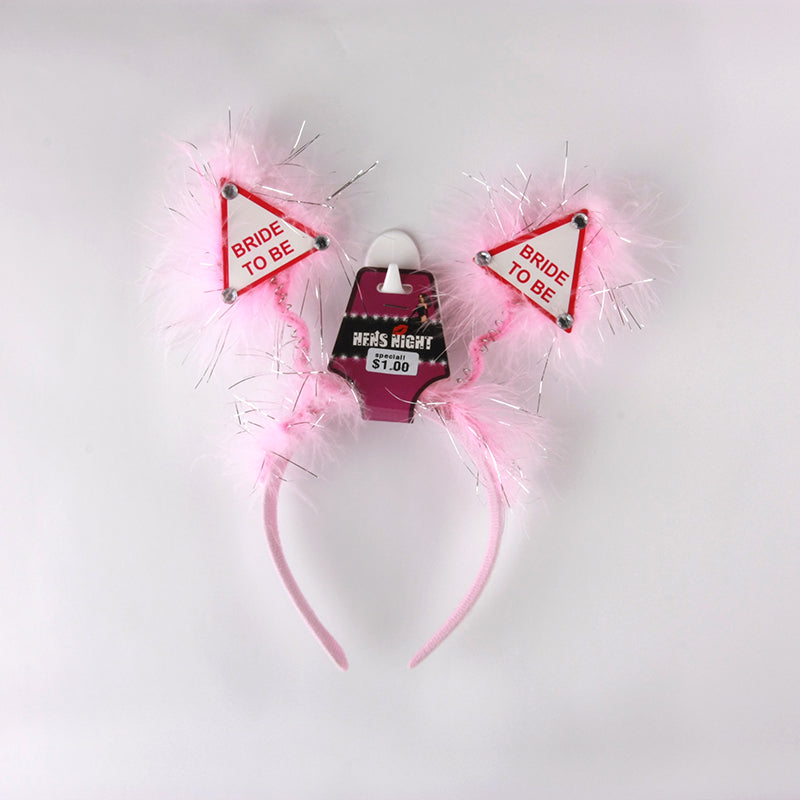 Hens Night Hair Band with pink fluffy ears and 'Bride to Be' signs for bachelorette parties.