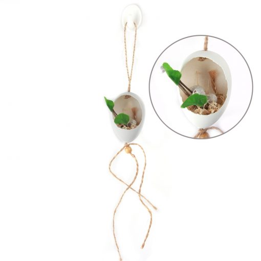 H.egg hanging planter with small green plant and natural decor inside a white eggshell design.