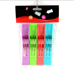 Package of colorful L pegs in purple, green, red, and blue for hanging items securely.
