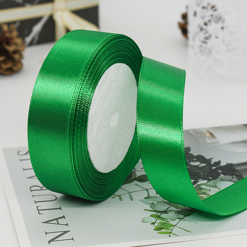 🧵 Premium Satin Ribbon – Versatile & Elegant in vibrant green, perfect for gift wrapping and craft projects.