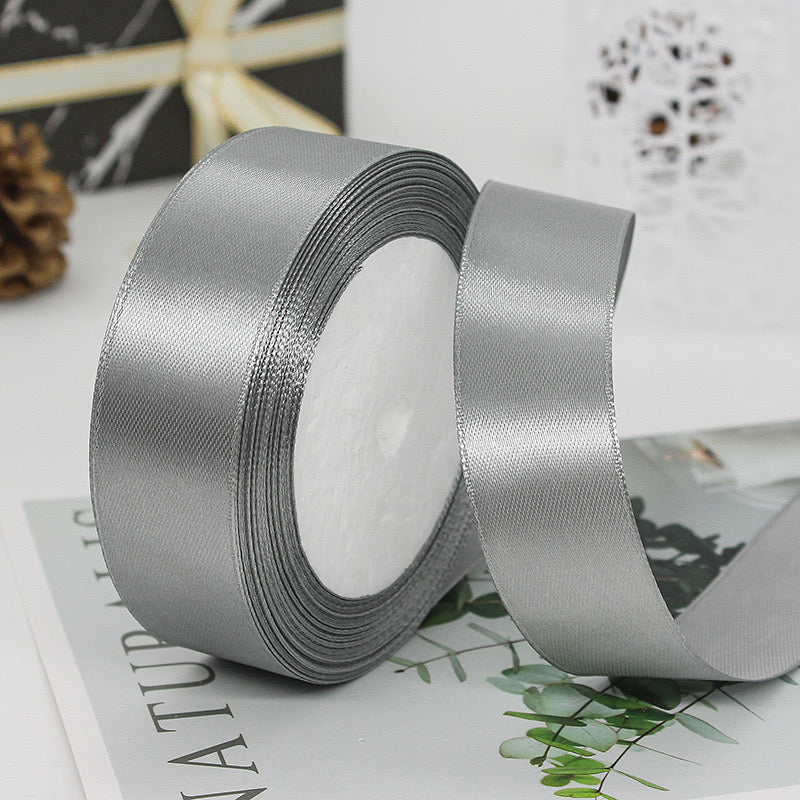 🧵 Premium Satin Ribbon – Versatile & Elegant in soft gray hues, perfect for elegant gift wrapping and DIY craft projects.