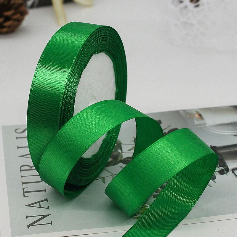🧵 Premium Satin Ribbon – Versatile & Elegant in vibrant green ideal for gift wrapping and DIY projects.