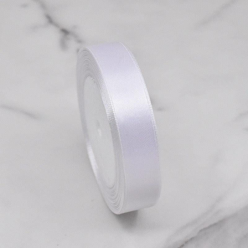 🧵 Premium Satin Ribbon – Versatile & Elegant in a roll showcasing its luxurious satin finish and soft sheen.