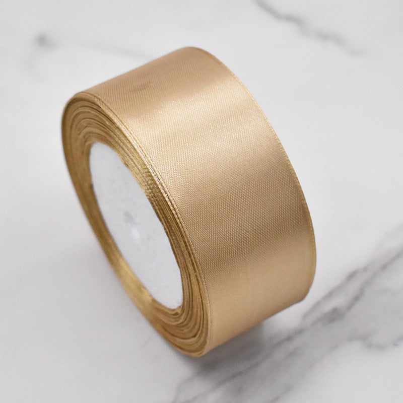 🧵 Premium Satin Ribbon – Versatile & Elegant roll on marble surface for gift wrapping and crafts.