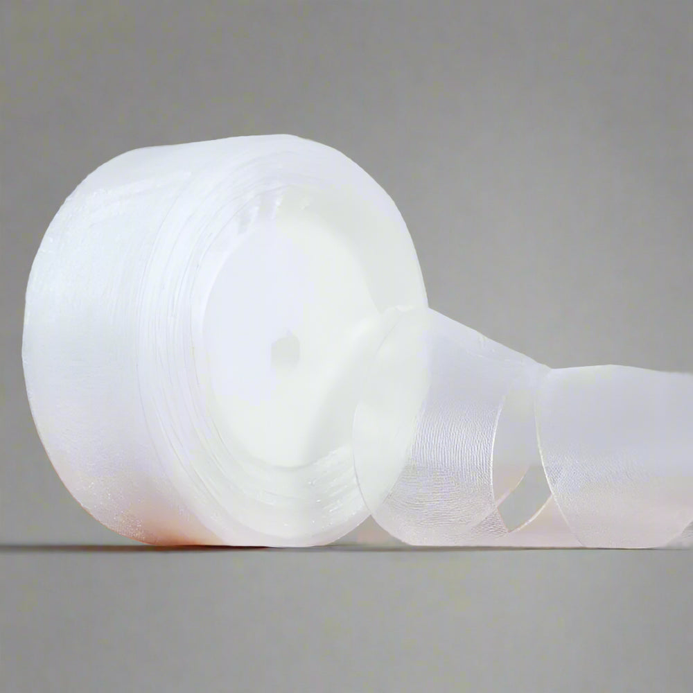 🎀 Sheer Organza Ribbon – Elegant & Versatile Finish in a roll, showcasing its delicate sheer texture and flexibility.