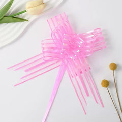 Pulling Ribbon(10PCS/3*47CM) in pink color, styled as a decorative bow for gifts and crafts.
