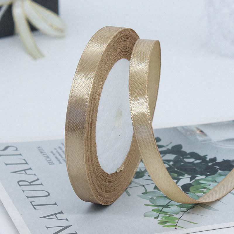 🧵 Premium Satin Ribbon – Versatile & Elegant in a luxurious gold finish, perfect for gift wrapping and crafts.