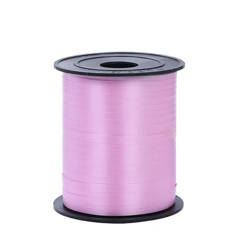Curling Ribbon Roll(0.5CM*200M/Dark Pink) on a spool, perfect for gift wrapping and decorations.