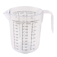Clear plastic Measuring Cup with measurement markings for precise cooking and baking.