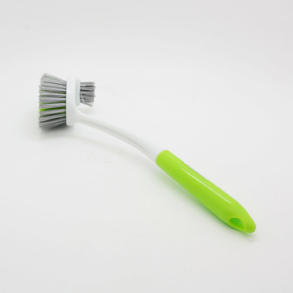 B.S Brush with a green handle and grey bristles, ideal for cleaning and scrubbing surfaces.