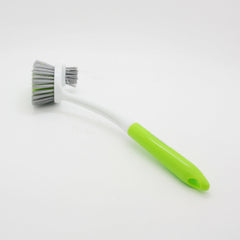 B.S Brush with a green handle and grey bristles, ideal for cleaning and scrubbing surfaces.