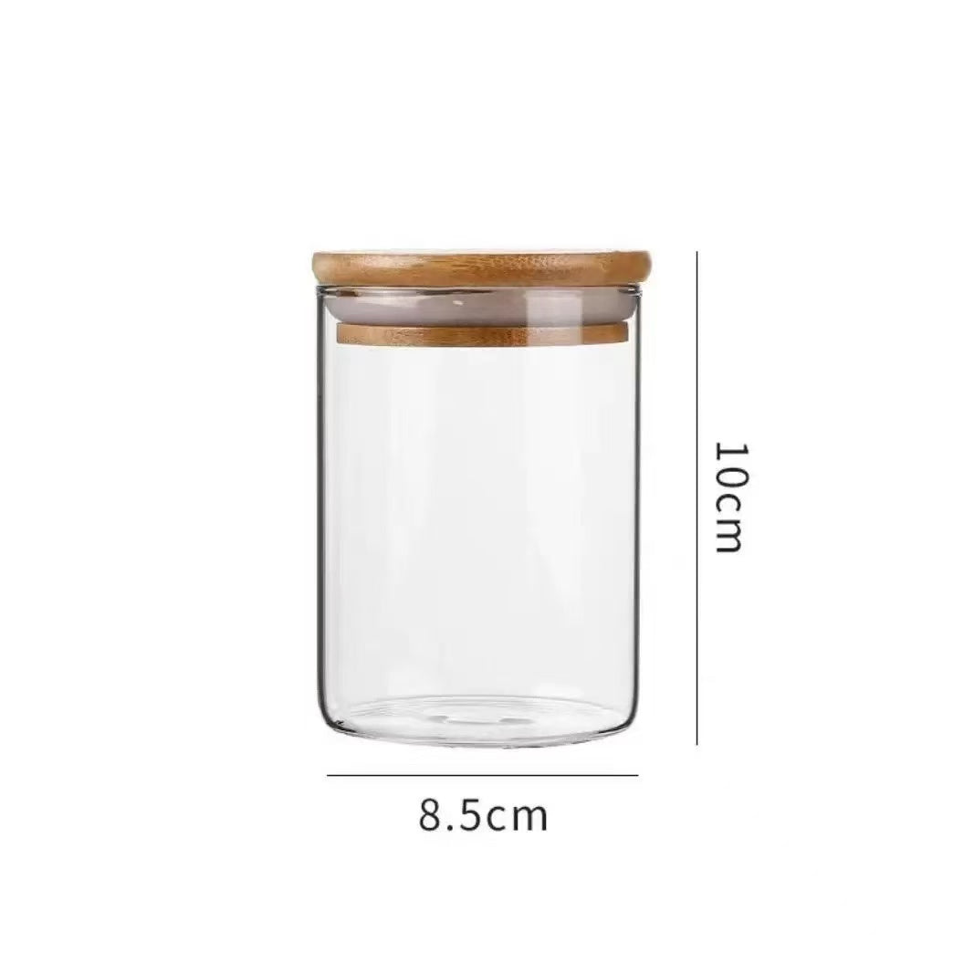 Glass Storage Jar with Wooden Lid(8.5*10CM) showcasing its sleek design and dimensions 8.5cm by 10cm.